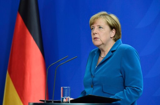 Bundeskanzlerin Angela Merkel unterbricht ihren Urlaub und nimmt kurzfristig am Donnerstag Stellung zur politischen Lage. Foto: AFP