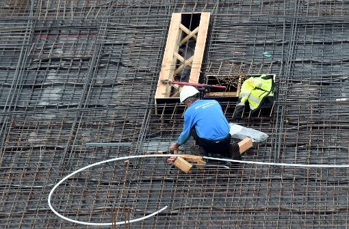 Bauarbeiter aus Polen und Ungarn müssen in Deutschland den Mindestlohn bezahlt bekommen. Foto: dpa
