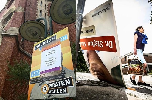 Wahlkampf-Vandalismus: Ein Plakat der Piraten wurde überklebt (links), das Konterfei von CDU-Kandidat Stefan Kaufmann heruntergerissen. Foto: Montage/StN/Leif Piechowski