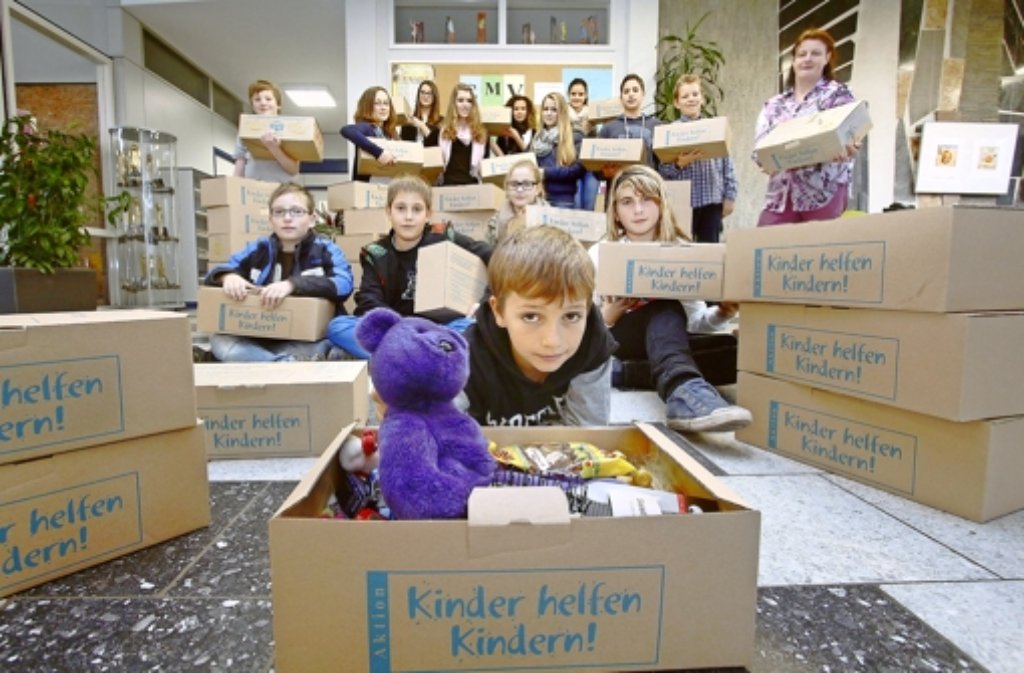Jugendliche helfen Kindern. Foto: factum/Granville