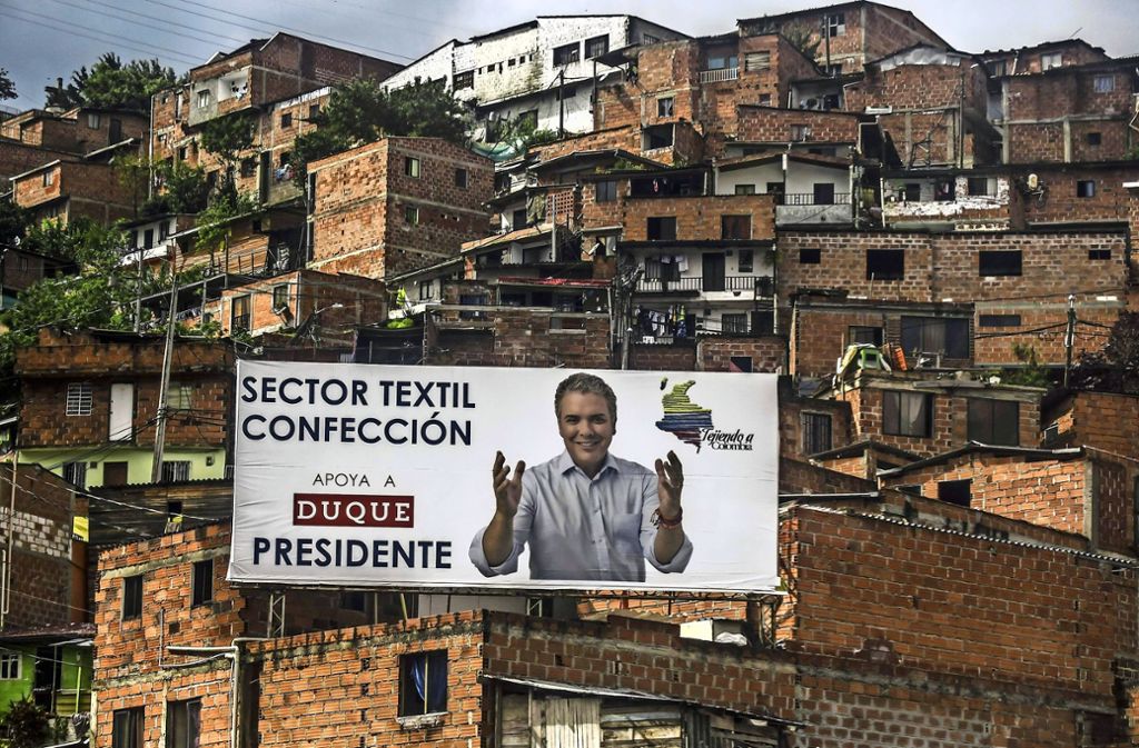 Ein Werbeplakat für den kolumbianischen Präsidentschaftskandidaten Ivan Duque. Foto: AFP