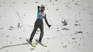 Kamil Stoch ist zum dritten Mal Sieger  der  Vierschanzentournee. Foto: AFP/GEORG HOCHMUTH