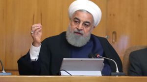 Zum Jahrestag des US-Ausstiegs aus dem internationalen Atomabkommen mit dem Iran hat der iranische Präsident Ruhani einen Teilausstieg seines Landes aus dem Deal bekannt gegeben. Foto: dpa/Ebrahim Seydi
