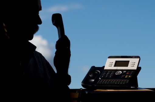 Organisierte Kriminalität: Trickbetrüger geben sich am Telefon als Polizisten aus – und machen fette Beute. Foto: dpa