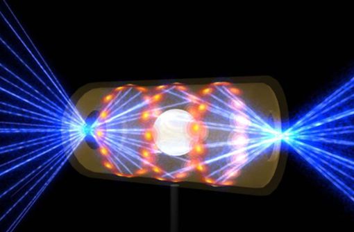 Diese Illustration zeigt ein NIF-Target-Pellet in einer Hohlraumkapsel mit Laserstrahlen, die durch Öffnungen an beiden Enden eintreten. Die Strahlen komprimieren und erhitzen das Target auf die Bedingungen, die für die Kernfusion erforderlich sind. Foto: dpa/ratoty