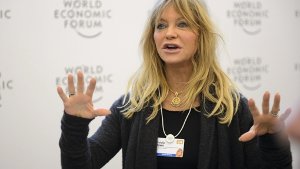 Meditation mit Goldie Hawn: Beim Weltwirtschaftsforum werben Promis um offene Ohren für ihre sozialen Anliegen. Foto: dpa