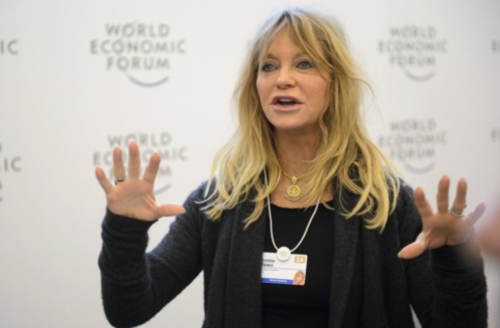Meditation mit Goldie Hawn: Beim Weltwirtschaftsforum werben Promis um offene Ohren für ihre sozialen Anliegen.