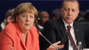 Bundeskanzlerin Merkel und der türkische Staatspräsident Erdogan Foto: dpa