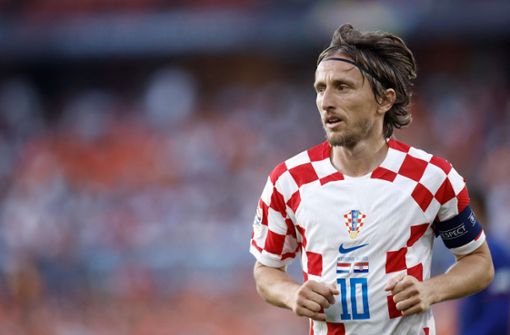 Die kroatischen Fans wollen, dass Luka Modric bleibt. Foto: AFP/KENZO TRIBOUILLARD