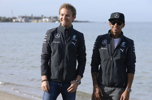 Ziemlich beste Feinde: Nico Rosberg (links) und Lewis Hamilton. Foto: dpa