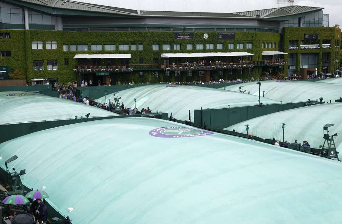 Tennis in Wimbledon Der zweite Turniertag fällt nahezu komplett ins Wasser 