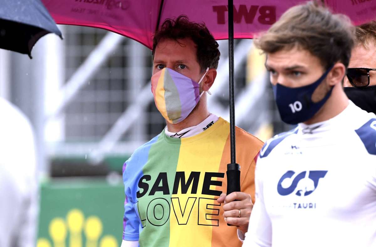 Sebastian Vettel (links) im Regenbogen-T-Shirt Foto: imago images/Laci Perenyi/Andre Jerry
