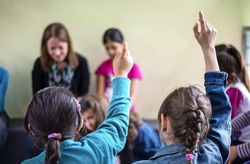 Kinder von Flüchtlingen lernen in der Rosensteinschule. Foto: dpa