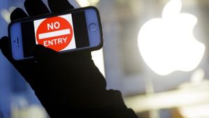 Seit langem schwelt der Streit der US-Behörden mit Apple wegen des Datenzugangs. Foto: dpa