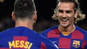 Über die Strafe für den FC Barcelona können viele nur Lächeln. Foto: AFP/LLUIS GENE