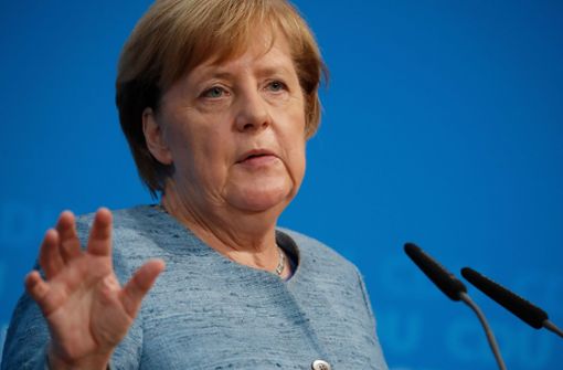 Angela Merkel will in bestimmten Städten die Diesel-Fahrverbote erschweren. Foto: AFP