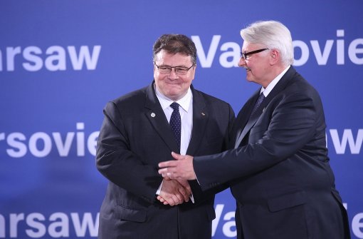 Litauens Außenminister Linas Linkevičius mit seinem polnischen Amtskollegen Witold Waszczykowski auf dem Nato-Gipfel in Warschau Foto: dpa