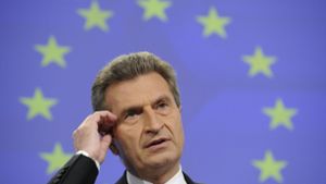 Oettinger spricht sich für baldiges Treffen Merkels mit Putin aus