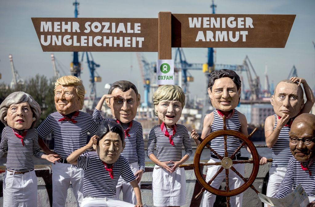 Die wichtigen sieben Politiker beim G20-Gipfel: Angela Merkel, Donald Trump, Wladimir Putin, Xi Jinping, Recep Tayyip Erdogan, Emmanuel Macron und der Vertreter von König Salman aus Saudi-Arabien, Ibrahim al-Assaf.