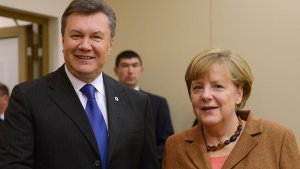 Der ukrainische Präsident Viktor Janukowitsch und Bundeskanzlerin Angela Merkel Foto: dpa