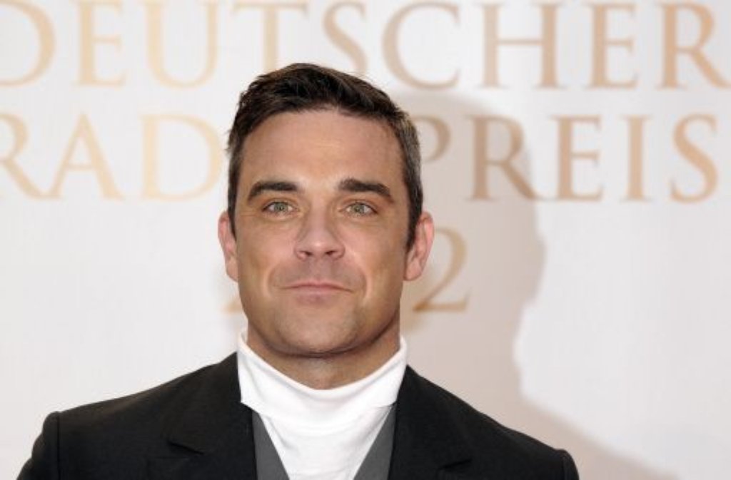 Der Weg war lang und steinig: Vom einstigen Teenageridol hat sich Robbie Williams zum anerkannten Musiker durchgekämpft - Drogenexzesse, Schlägereien und (angedichtete) Affären inklusive. Seit der Hochzeit mit Ayda Field im Jahr 2010 ist es ruhiger geworden um den Popstar, der am Dienstag Vater einer Tochter geworden ist. Wir blicken noch einmal auf die Karriere des 38-Jährigen zurück ...