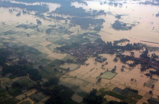 Durch Überschwemmungen und Erdrutsche sind in Nepal und Indien dutzende Menschen ums Leben gekommen. Foto: AP