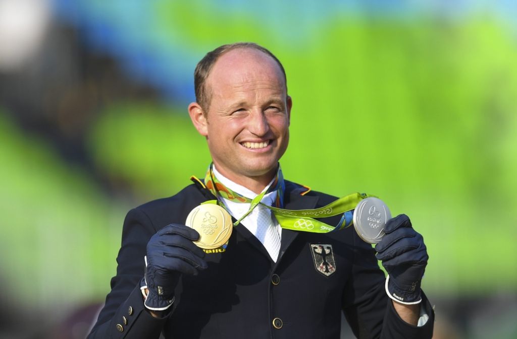 Einzelgold und Mannschaftssilber – Michael Jung bringt gleich zwei Medaillen aus Rio mit nach Hause an den Neckar. Foto: AAP