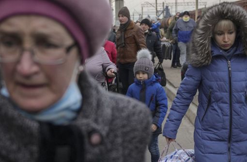 Menschen auf Flucht aus Donezk. Foto: dpa/Vadim Ghirda
