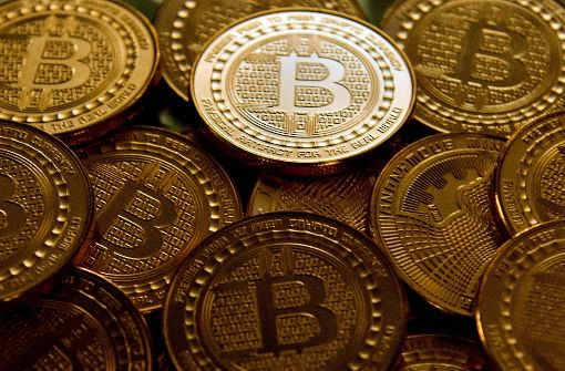 Seit Mitternacht gibt es an der US-Börse CBOE den ersten Future auf den Bitcoin an einem beaufsichtigten Handelsplatz. Foto: AFP