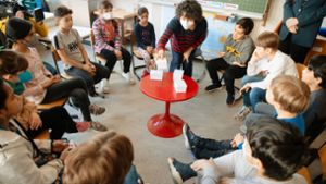 Mit einem Ratespiel macht Deutschlernen gleich mehr Spaß. Foto: Lichtgut/Leif Piechowski