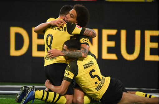 Hatten einmal mehr Grund zum Jubel als der Bayern München: die Spieler von Borussia Dortmund. Foto: AFP