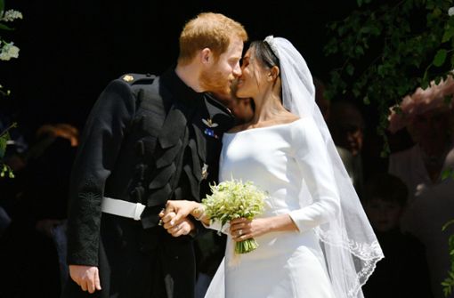 Ein erster Kuss als Mann und Frau: Prinz Harry und Meghan Markle an ihrem Hochzeitstag. Foto: POOL