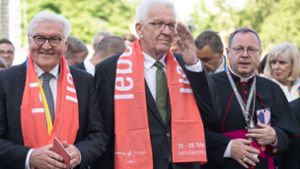 Winfried Kretschmann (Mitte) beim Katholikentag in Stuttgart. Foto: dpa/Marijan Murat