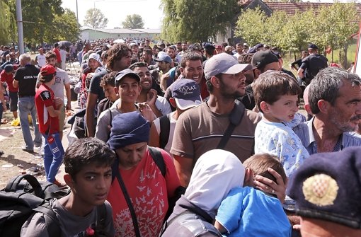 Flüchtlinge an der kroatisch-serbischen Grenze bei Tovarnik am 19. September 2015. Foto: dpa
