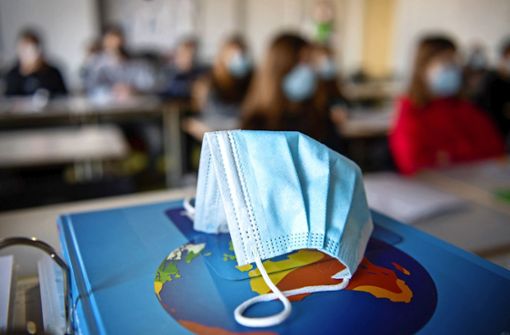 Nicht alle  Schüler freuen sich,  ohne Maske im Klassenzimmer zu sitzen. Foto: dpa/Matthias Balk