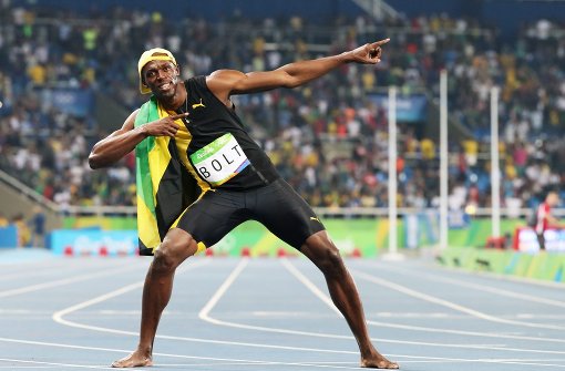 Als der Usain Bolt seinen Sieg bereits feiert, kommt der eine oder andere TV-Zuschauer eben erst aus dem Bett. Foto: EPA