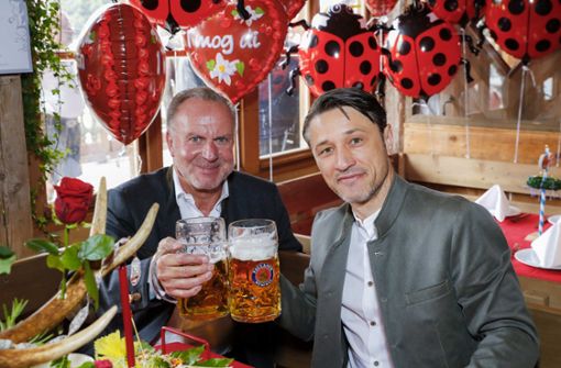 Gelöst sieht anders aus: FC-Bayern-Vorstandschef Karl-Heinz Rummenigge und Trainer Niko Kovac kamen trotz 0:3-Heimniederlage aufs Oktoberfest. Foto: Getty Abo