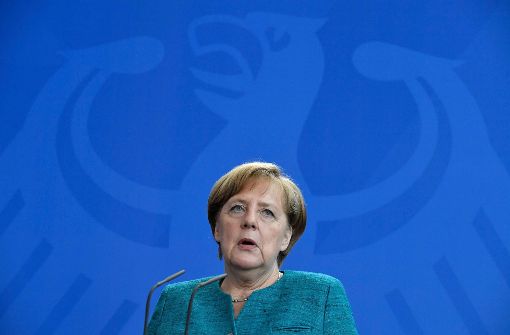 Angela Merkel lobt die Einigung der Euro-Finanzminister auf weitere Griechenland-Hilfen. Foto: AFP