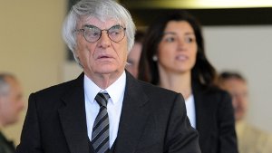 Formel-1-Chef Bernie Ecclestone und seine Frau Fabiana Flosi im Landgericht München. Foto: dpa