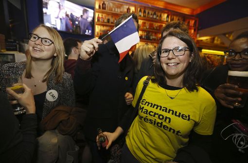 Jubel und Erleichterung: Macrons Anhänger in Paris Jubel und Erleichterung: Macrons Anhänger in Paris. Foto: dpa