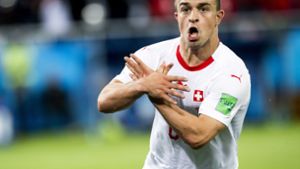 Xherdan Shaqiri sorgte bei der WM 2018 mit dieser provokanten Geste gegen Serbien für Aufsehen. Foto: Keystone