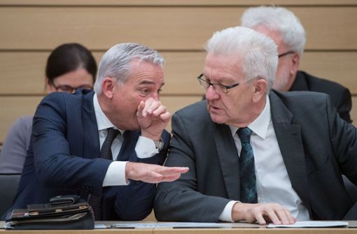 Zwischen Winfried Kretschmanns (rechts) Grünen und Thomas Strobls CDU gibt es Streit um den Koalitionsvertrag. Foto: dpa