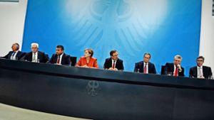 Die Kanzlerin trifft sich mit Oberbürgermeistern und Ministerpräsidenten. Foto: AFP