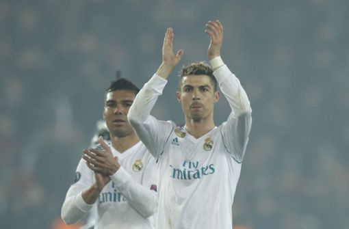 Die beiden Torschützen Cristiano Ronaldo (rechts) und Casemiro sichern den Sieg von Real Madrid gegen Paris. Foto: AP