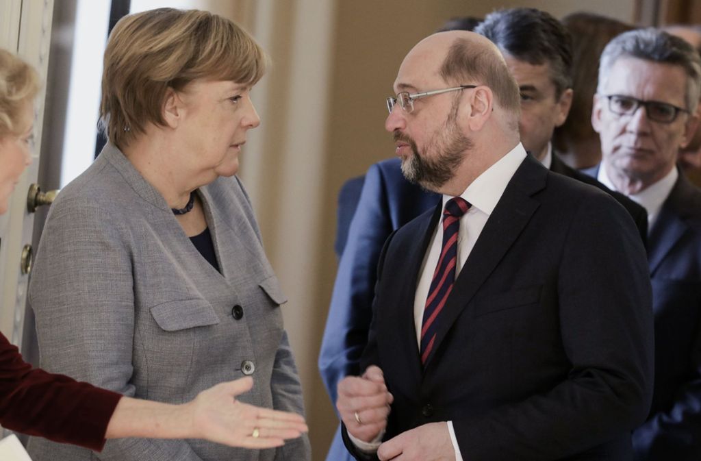 Kanzlerin Angela Merkel und  SPD-Chef Martin Schulz müssen noch viele inhaltliche Hürden überwinden. Foto: dpa