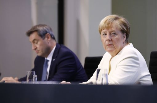 Bundeskanzlerin Angela Merkel und die Ministerpräsidenten wie Markus Söder treffen sich am Dienstag wieder zu Gesprächen über die Corona-Regeln. Foto: imago images/Metodi Popow