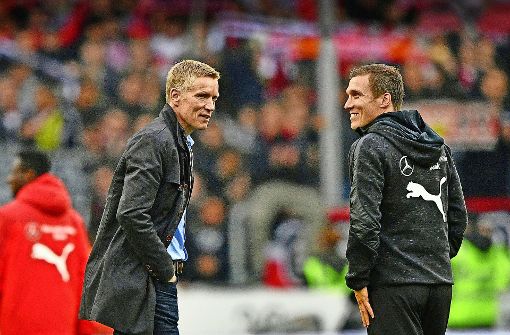 Sportvorstand Jan Schindelmeiser (links) hat Trainer Hannes Wolf von Dortmund nach Stuttgart gelotst – und dafür viel Anerkennung bekommen. Foto: Eibner