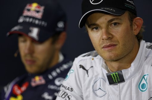In einem packenden Endspurt hat Spitzenreiter Nico Rosberg (vorne) Formel-1-Weltmeister Sebastian Vettel noch die Pole Position für den Großen Preis von Großbritannien weggeschnappt.  Foto: Getty Images Europe