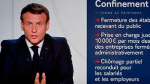 Präsident Emmanuel Macron erklärt den Franzosen, was die neuen Corona-Beschränkungen für sie bedeuten. Foto: AFP/LUDOVIC MARIN