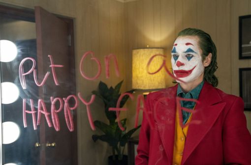 Abschreckende Figur oder gefährliches Vorbild   – Joaquin Phoenix als Joker. Foto: AP/Niko Tavernise